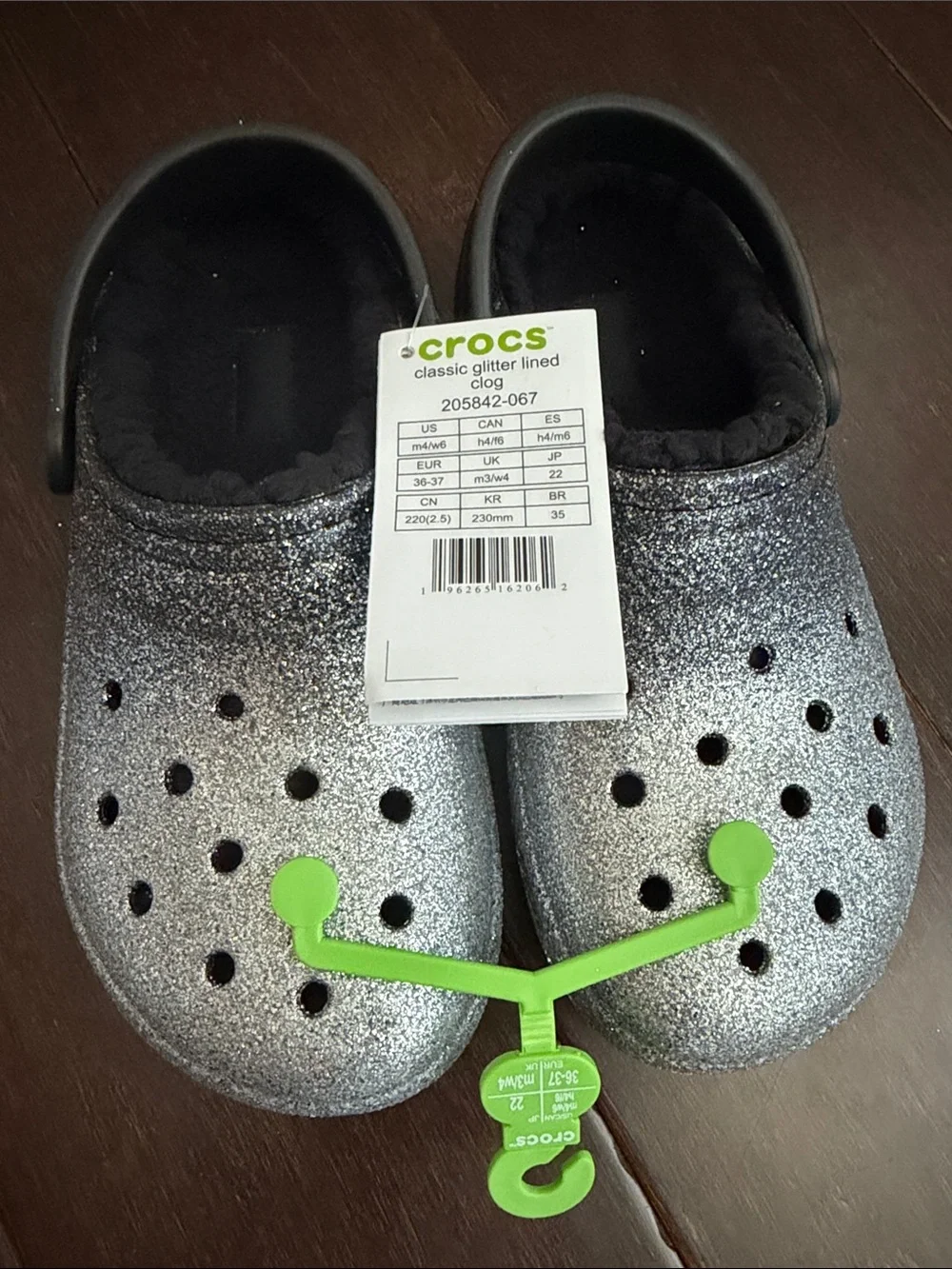 CROCS Kids' Glitter Clog in Black and Silver